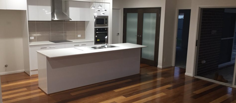 Side View Of Shiny Professional Floor At The Kitchen — Timber Floors In Central Coast, NSW